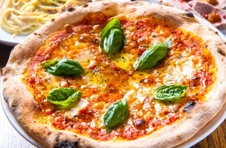 Photo for Delicious italian pizza with fresh ingredients - Royalty Free Image