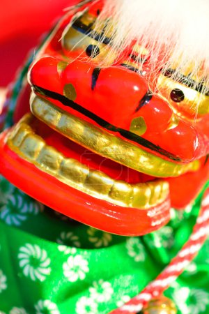 Photo for Scary  Japanese dance lion  on background - Royalty Free Image