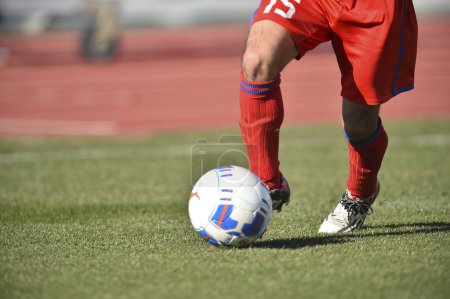 Photo for Cropped view of football soccer in Japan - Royalty Free Image