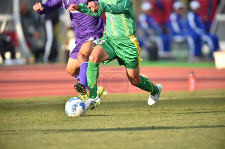 Photo for Cropped view of football soccer in Japan - Royalty Free Image