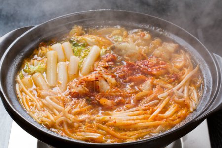 Photo for Pot of spicy food with noodles and meat - Royalty Free Image