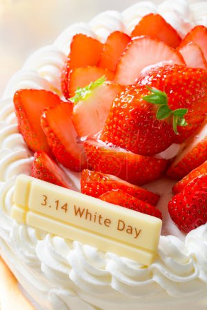 Photo for Cake with strawberries and a white chocolate bar - Royalty Free Image