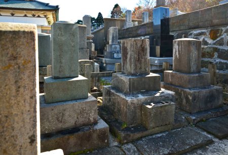 Photo for Close-up shot of traditional japanese tombstones on graveyard - Royalty Free Image