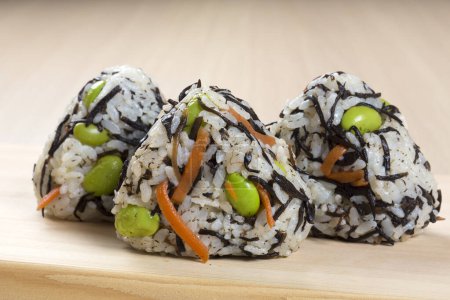 Photo for Onigiri sushi on a light background, close up - Royalty Free Image