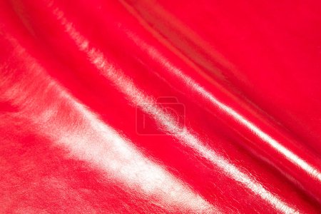 Téléchargez les photos : Matériau en cuir rouge avec une finition très brillante - en image libre de droit