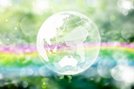 Photo for Transparent earth globe on the background of green grass. elements of this image furnished by nasa - Royalty Free Image