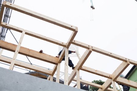 Photo for New house under construction. Building with wooden beams - Royalty Free Image