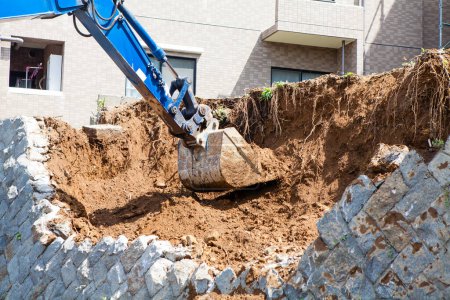 Photo for View of excavator working at the construction site. - Royalty Free Image