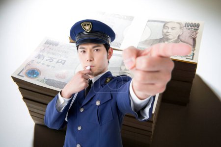 Photo for Portrait of young police officer with whistle on money banknotes background - Royalty Free Image