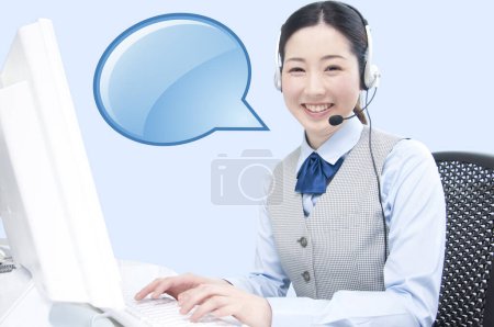 Photo for Young female customer operator with headset and empty speech bubble - Royalty Free Image