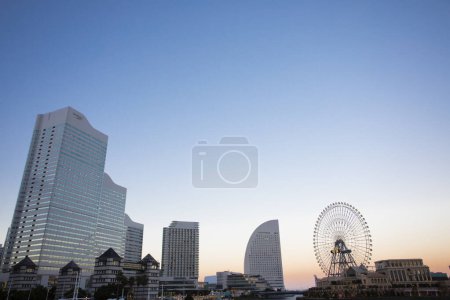 Photo for View of Yokohama Minato Mirai 21 skyscrapers and ferris wheel. Greater Tokyo area in Japan - Royalty Free Image