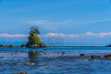 beautiful landscape of the bay with rocky island and mountains. Toyama Bay, Japan.     