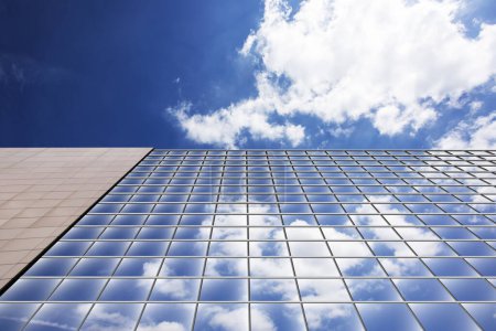 Photo for Bottom view of skyscraper with blue sky on background - Royalty Free Image