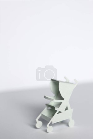 Photo for Small white paper Baby stroller - Royalty Free Image