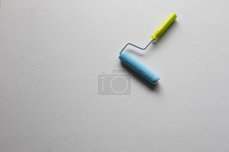 Photo for Blue painter roller with copy space, top view - Royalty Free Image
