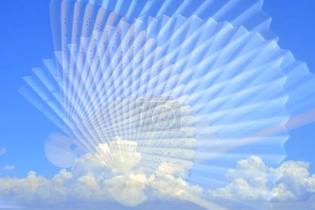 Photo for Abstract concept background with Hand fan over blue sky - Royalty Free Image
