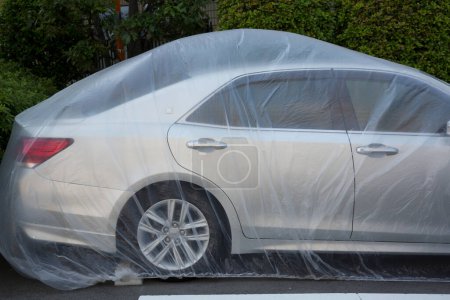 Photo for View of car covered with transparent foil - Royalty Free Image