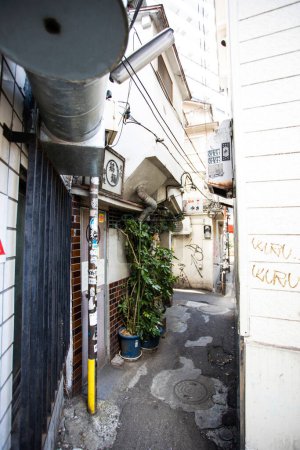 Photo for View of narrow street with old buildings in Japanese city - Royalty Free Image