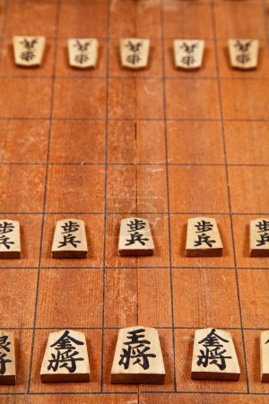 Photo for Wooden Japanese chess  on background, close up - Royalty Free Image