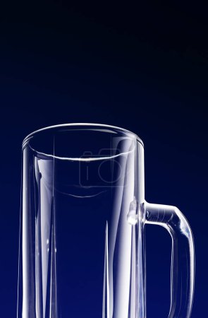 Photo for Empty beer glass black background with space for text - Royalty Free Image