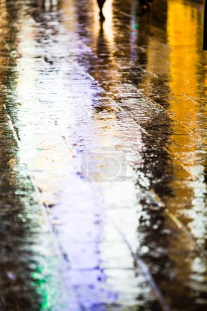 Photo for Wet sidewalk during rainy weather - Royalty Free Image