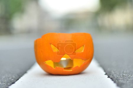 Photo for Carved pumpkin with candle inside, Halloween concept - Royalty Free Image