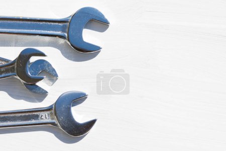 Photo for Wrenches on wooden background, construction and building concept background - Royalty Free Image