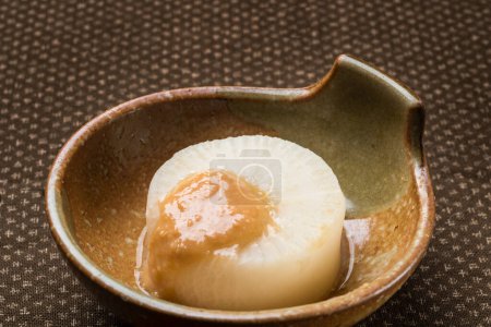 Photo for Japanese traditional food, Furofuki daikon and sake - Royalty Free Image