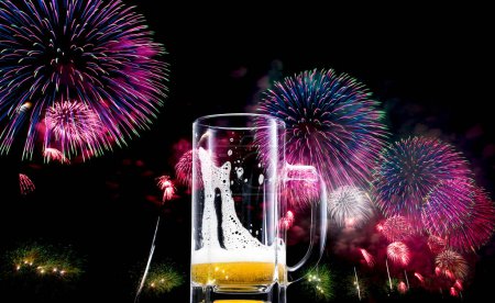 Photo for Beer glass with colorful fireworks on background - Royalty Free Image