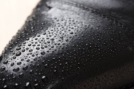 Photo for Male black leather shoe with water drops, closeup, footwear concept - Royalty Free Image