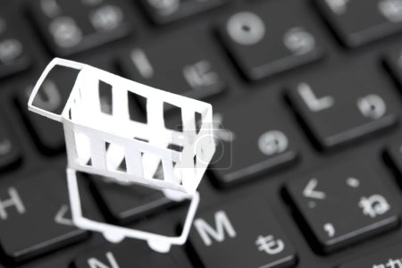 Photo for Online shopping. keyboard with shopping cart - Royalty Free Image