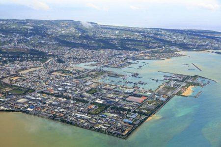 aerial view of the sea and Itoman city in Okinawa Prefecture, Japan. 