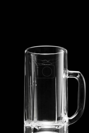 Photo for Empty beer glass black background with space for text - Royalty Free Image