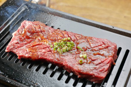 Photo for Fresh and delicious beef steak on grill - Royalty Free Image