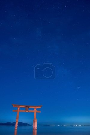 Photo for Shirahige Jinjia at night. Torii in Lake Biwa, Shirahige Shrine, Takashima, Shiga, Japan - Royalty Free Image