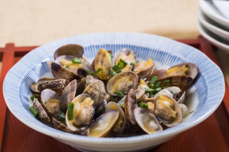 Photo for Boiled mussels with herbs and garlic, close up - Royalty Free Image