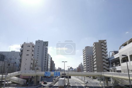Photo for Traffic in downtown city on a sunny day, Japan - Royalty Free Image