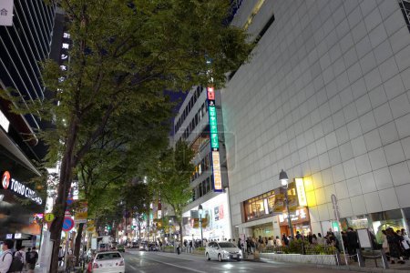 Photo for Illuminated street with mall building at Tokyo city at night, Japan - Royalty Free Image