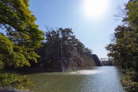 view of river and old wall near Iga Ueno Castle, also known as Ueno Castle  (Ueno-j) is a Japanese castle located in the city of Iga, Mie Prefecture in the Kansai region of Japan 