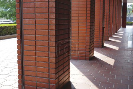 Photo for Red brick columns at modern city architecture, Tokyo, Japan - Royalty Free Image