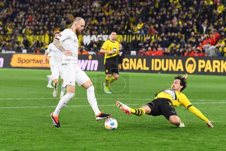 Foto de DORTMUND, ALEMANIA - 28 ENERO 2024: Mats Hummels, El partido de fútbol de la Bundesliga Borussia Dortmund vs Bochum en Signal Iduna Park - Imagen libre de derechos