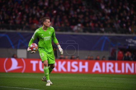 Photo for Leipzig, GERMANY - 13.02.24: Andriy Lunin, The match of match UEFA Champion League RB Leipzig vs Real Madrid at Red Bull Arena - Royalty Free Image