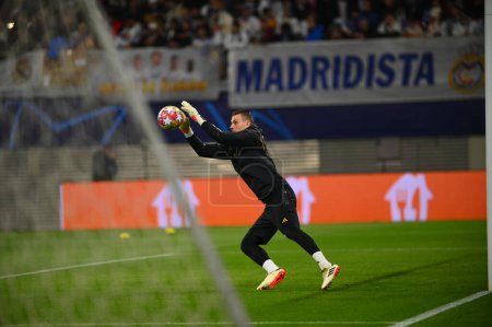Photo for Leipzig, GERMANY - 13.02.24: Andriy Lunin, The match of match UEFA Champion League RB Leipzig vs Real Madrid at Red Bull Arena - Royalty Free Image