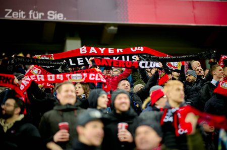 Photo for LEVERKUSEN, GERMANY - 23 FEBRUARY, 2024: Fans support. The Bundesliga match FC Bayer 04 Leverkusen vs 1. FSV Mainz 05 at BayArena - Royalty Free Image