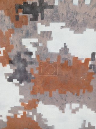 a brown and orange colored on the wall