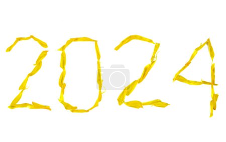 Téléchargez les photos : Nouvel An 2024 composé de pétales de fleurs Damiana sur fond blanc - en image libre de droit