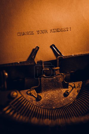 Photo for CHANGE YOUR MINDSET! typed words on a vintage typewriter. Close up. Antique Typewriter. - Royalty Free Image