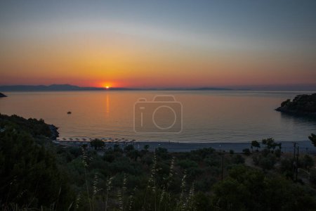 Sunrise over Tigani Beach near Tyros town, Peloponnese, Myrtoan Sea, GREECE in summer morning. Horizontal.