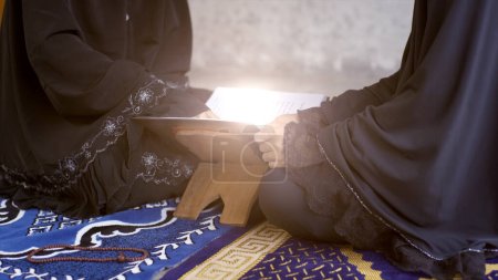 Photo for Asian muslim in a daily prayer at home - Royalty Free Image