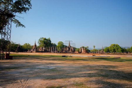 Photo for Historical sites ancient temple ruins Wat Si Chum and Wat Mahathat city of Sukhothai Historical Park, Sukhothai province, Thailand - Royalty Free Image